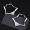 Prada 1IO206 Star Earrings In Metal Silver