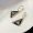 Prada 1JO977 Symbole Pendant Earrings In Metal Gold/Black