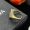 Prada Enamel Logo Triangle Ring In Metal Gold/White