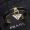 Prada Triangle Logo Charm Cuff Bracelet In Metal and Leather Black/Gold