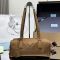 Prada 1BB127 Medium Top-Handle Bag in Re-Nylon and Leather with Padlock Brown