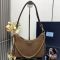 Prada 1BC204 Re-Edition Mini Bag in Suede Brown