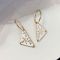 Prada 1JO977 Symbole Pendant Earrings In Metal Gold/White