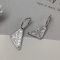 Prada 1JO977 Symbole Pendant Earrings In Metal Silver/White