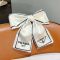 Prada Bow Hair Clip in Re-Nylon White