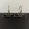Prada Logo Nameplate Pendant Earrings In Metal Silver/Black