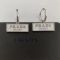 Prada Logo Nameplate Pendant Earrings In Metal Silver/White