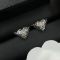 Prada Rose Triangle Stud Earrings In Metal Silver