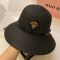 Prada Square Logo Bucket Hat in Raffia Black