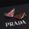 Prada Symbole Clip Earrings In Metal Silver/Red