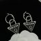 Prada Triangle Lock Earrings In Metal Black