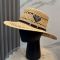 Prada Triangle Logo Cut-out Wide Brim Sun Hat in Raffia Beige/Black