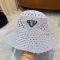 Prada Triangle Logo Knitted Bucket Hat in Cotton Blue