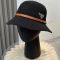 Prada Triangle Logo Knitted Bucket Hat in Cotton with Buckle Strap Black