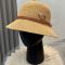 Prada Triangle Logo Knitted Bucket Hat in Cotton with Buckle Strap Brown