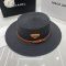 Prada Triangle Logo Wide Brim Sun Hat in Raffia Black