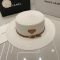 Prada Triangle Logo Wide Brim Sun Hat in Raffia White