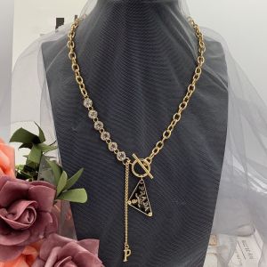 Prada Enamel Triangle Pendant Necklace in Metal with Crystals Gold/Black
