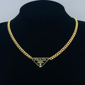 Prada Enamel Triangle Pendant Necklace In Metal Gold