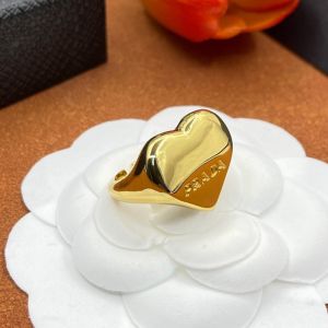 Prada Logo Heart Ring In Metal Gold