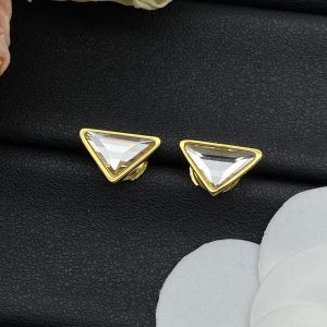 Prada Triangle Crystal Earrings In Metal Gold
