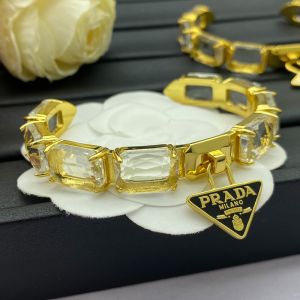 Prada Triangle Crystals Cuff Bracelet In Metal Gold/Black