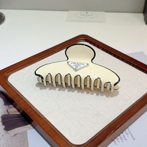 Prada Triangle Logo Hair Clip in Acetate Beige