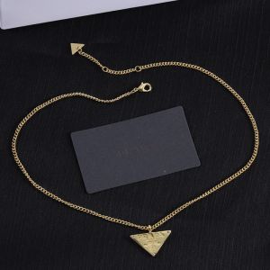 Prada Triangle Pendant Necklace In Metal Gold